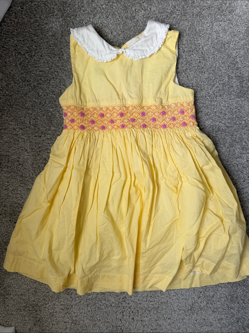 Rachel Riley Yellow Dress with White Peter Pan Collar and Pink Smocking